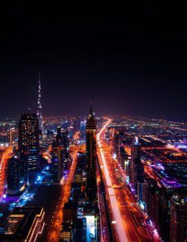 High Rise Buildings during Night Time Photo