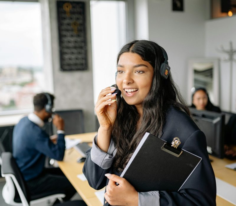 Pretty Woman Talking on a Headphones